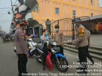 Cegah Kabut Asap Makin Tebal Polsek Tebing Tinggi Bagikan Masker kepada Masyarakat