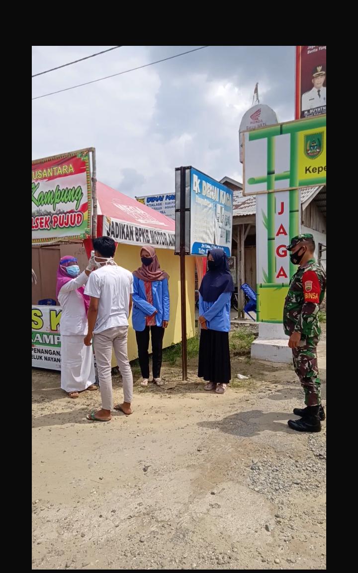 Mahasiswa KKN UIN Suska Riau Ikut Kegiatan “Jaga Kampung” di Rokan Hilir